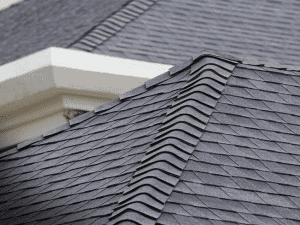 Close-up of asphalt roof shingles during a home inspection in Jacksonville, FL